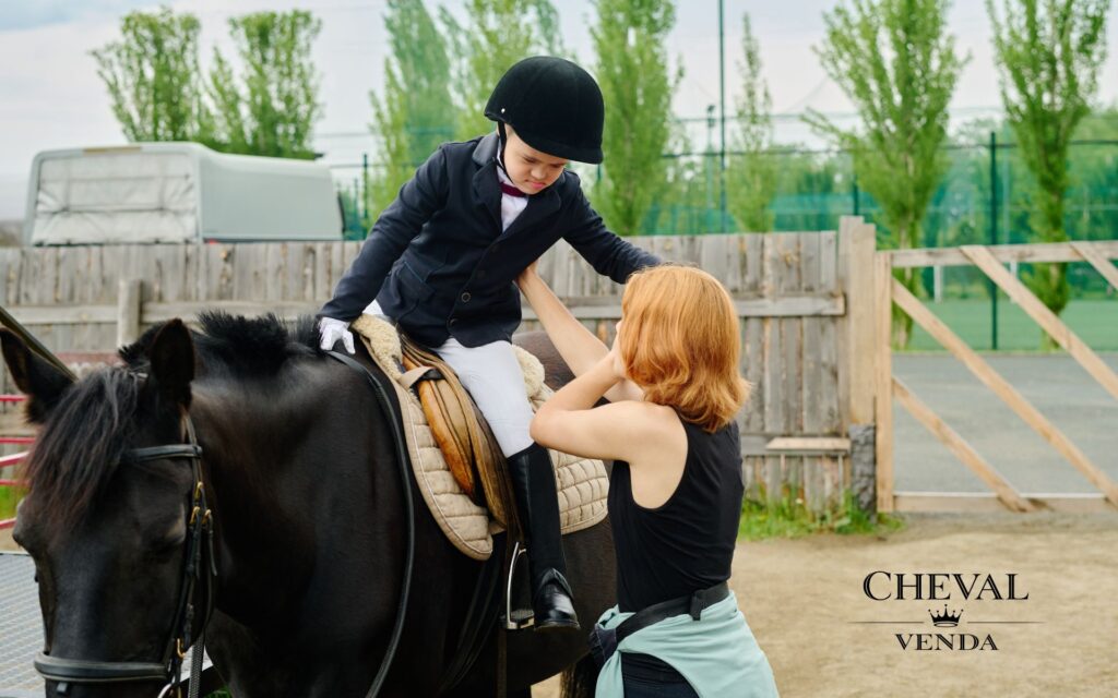 Ung ryttare och förälder